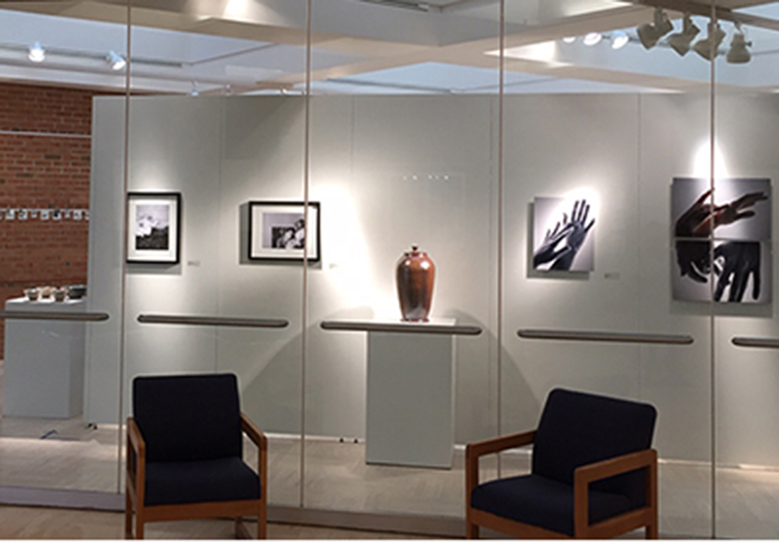 Installation image from outside of gallery featuring Huber, Quinno, Vogelpohl